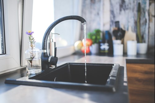 how to fix a dripping faucet in a kitchen tap running water